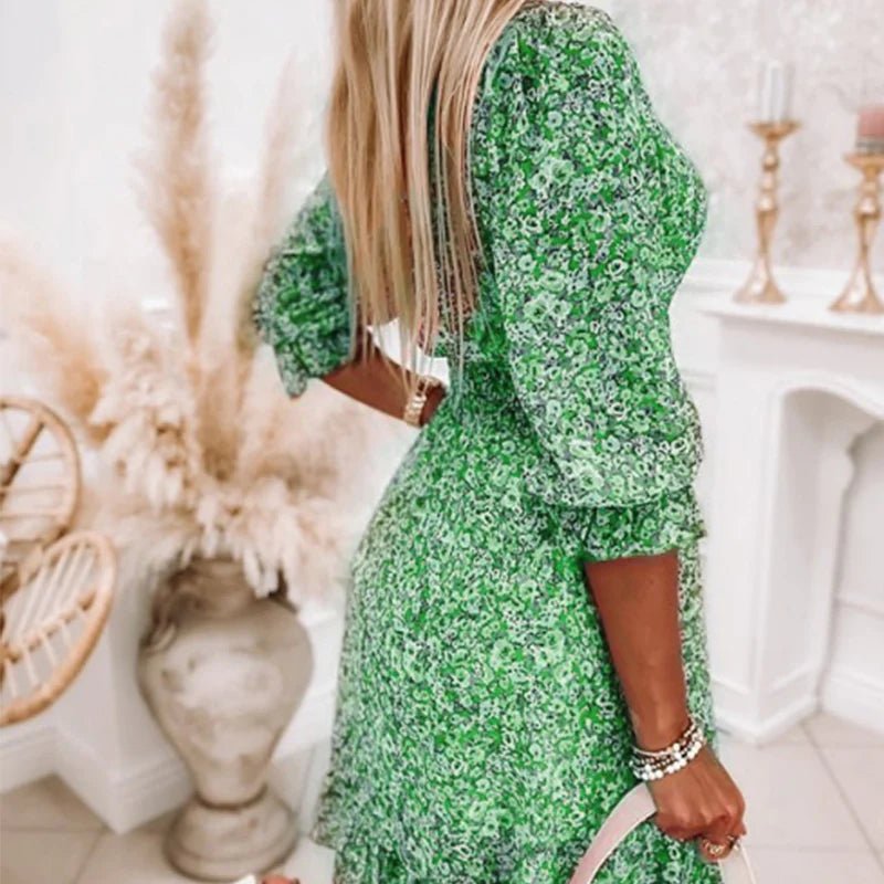 Emelie – Midi-klänning med v-ringning och blommönster
