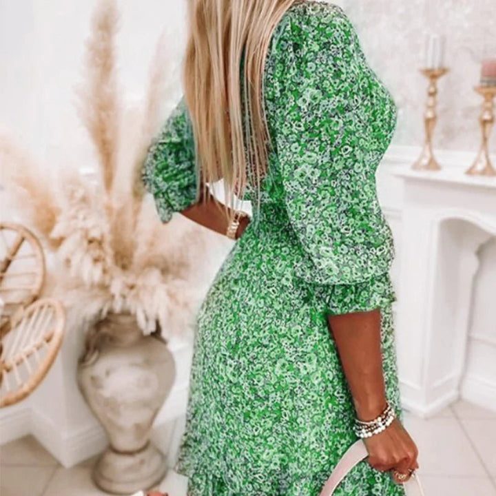 Emelie – Midi-klänning med v-ringning och blommönster