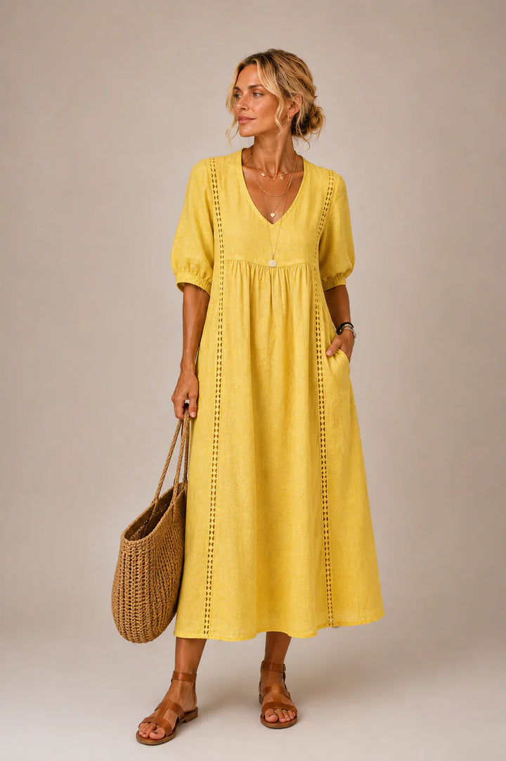 Ingrid – Luftig midiklänning med spetsdetaljer